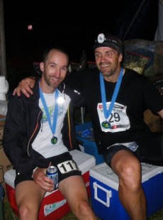 Jodi Isenor (left) with often partner in crime Mark Campbell, resting after completing a 100-mile trail race in 2011.