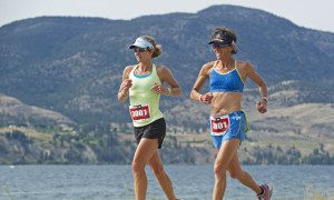 Lisa Bentley (right) and Lori Bowden during the run as part of Team Fraser's relay team at the 2012 Subaru Ironman Canada. (Photo: David McColm)