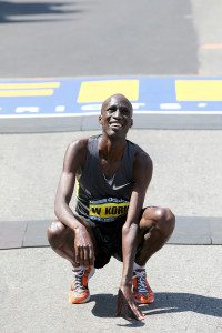 Wesley Korir touches the ground after winning the 2012 Boston Marathon Credit: photorun.net