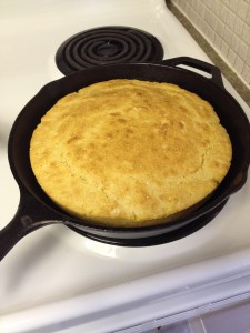 Cornbread cooked in a cast iron skillet.