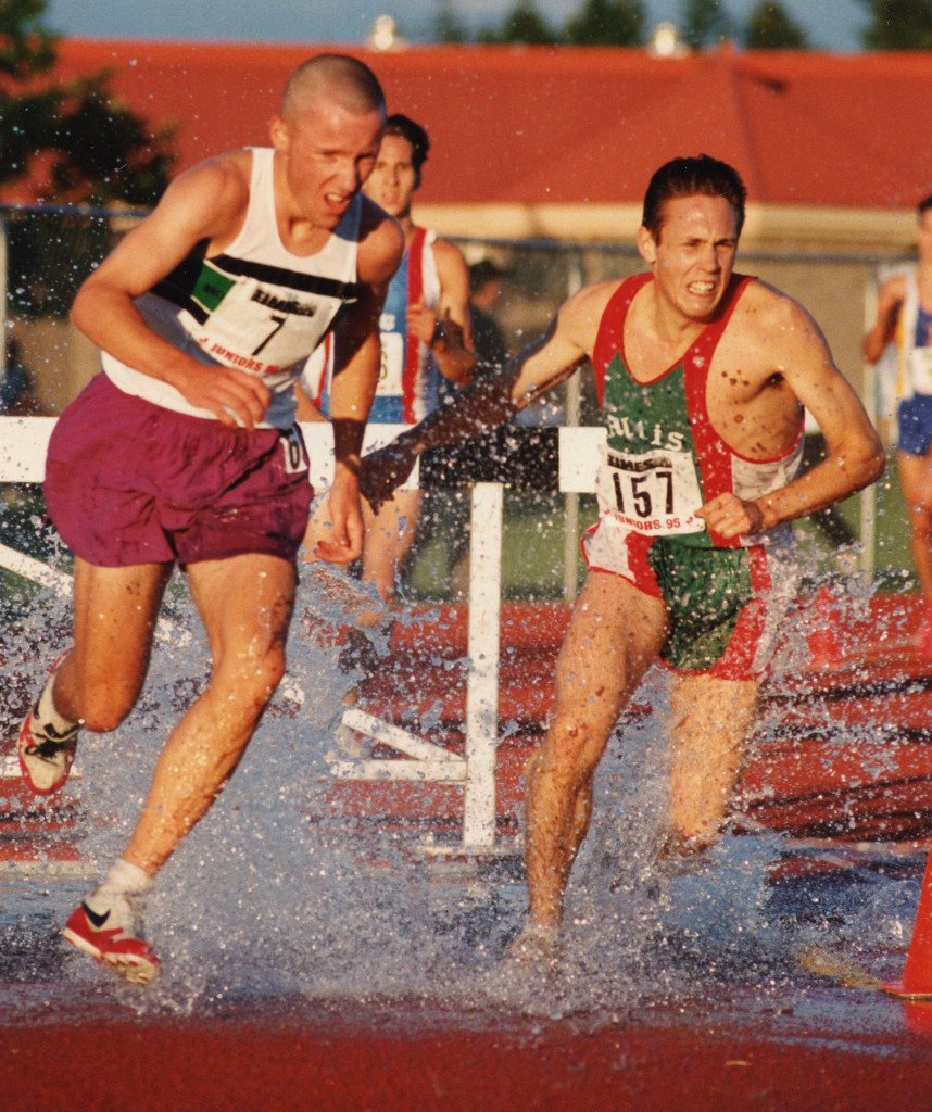 Klaus Mueller (right) en route to victory in the steeplechase at national juniors in Abbotsford in 1997.