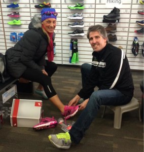 Jennifer suiting herself up with new pink running shoes with the help of Luke MacDonald at Aerobics First in Halifax. NS.