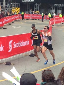 Hussain pushing hard at the finish of the ScotiaBank Toronto Waterfront half-marathon.