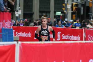  Mike coming down the finishing chute of the 2014 Toronto marathon. Photo: Anne Madden.
