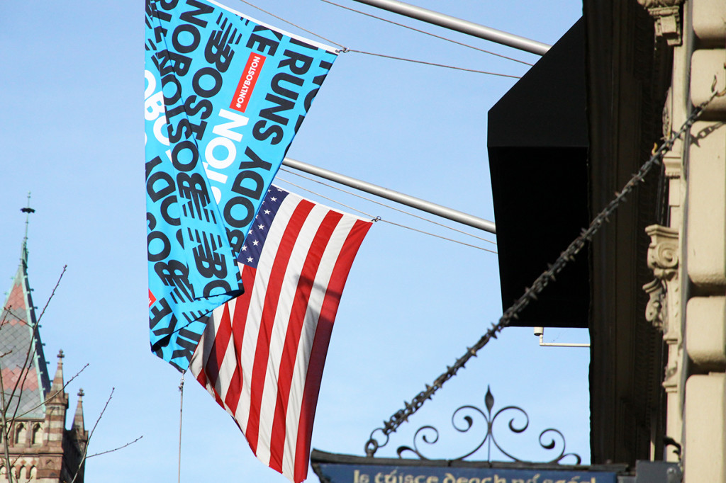 Alongside the American flag, many hotels and stores raise marathon-themed flags.