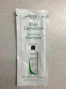 It definitely says "shampoo"