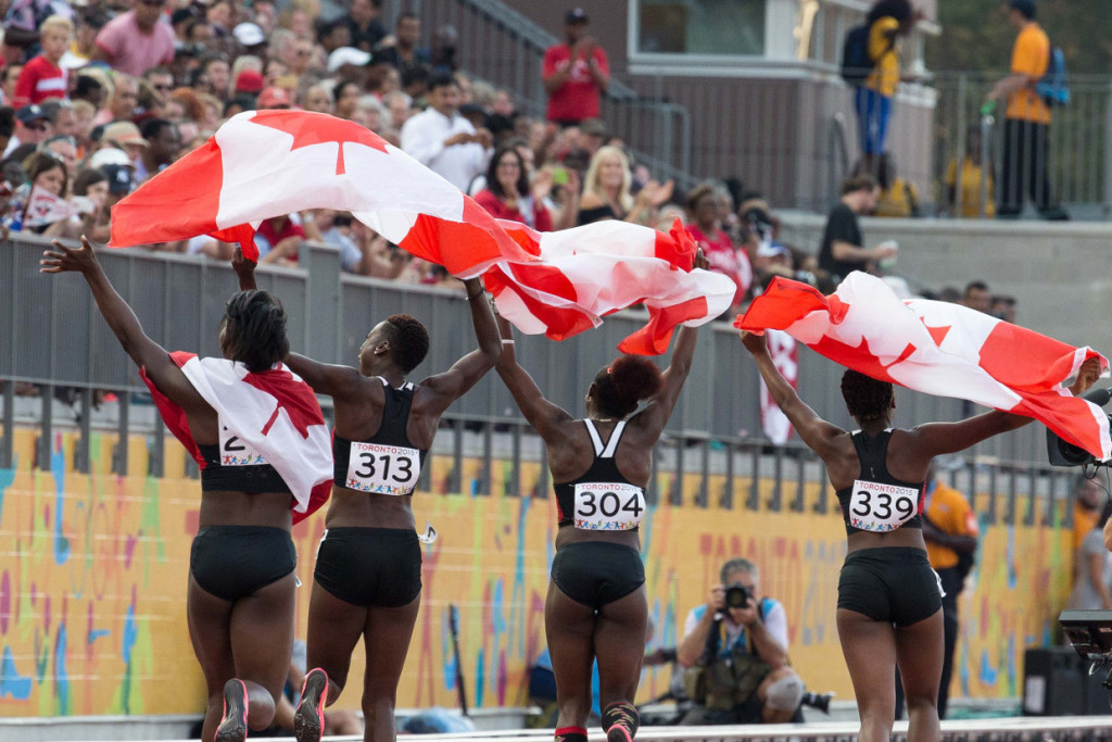 The Canadian women's 4x100m relay team celebrates their bronze medal.