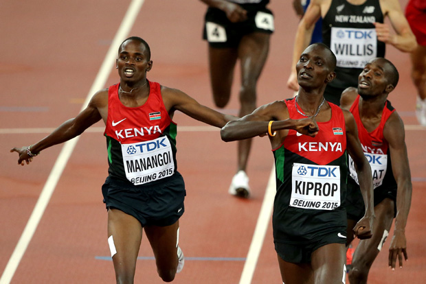BEIJING, CHINA - AUGUST 30:  Asbel Kiprop of Kenya crosses the finish line to win gold in the Men's 1500 metres final ahead of Elijah Motonei Manangoi of Kenya during day nine of the 15th IAAF World Athletics Championships Beijing 2015 at Beijing National Stadium on August 30, 2015 in Beijing, China.  (Photo by Lintao Zhang/Getty Images for IAAF)