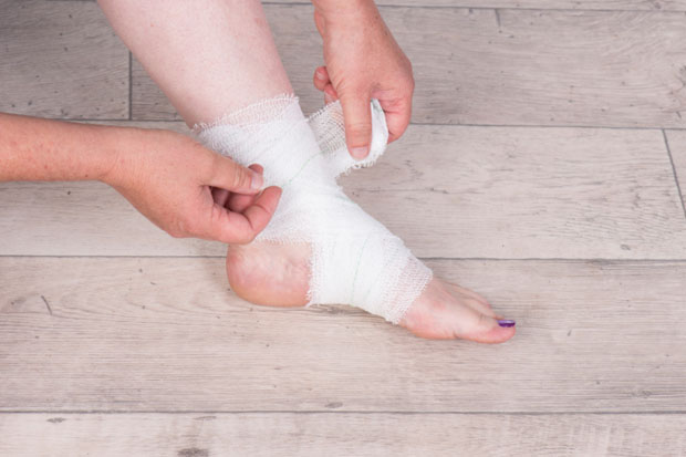 Wrapping an ankle in a bandage