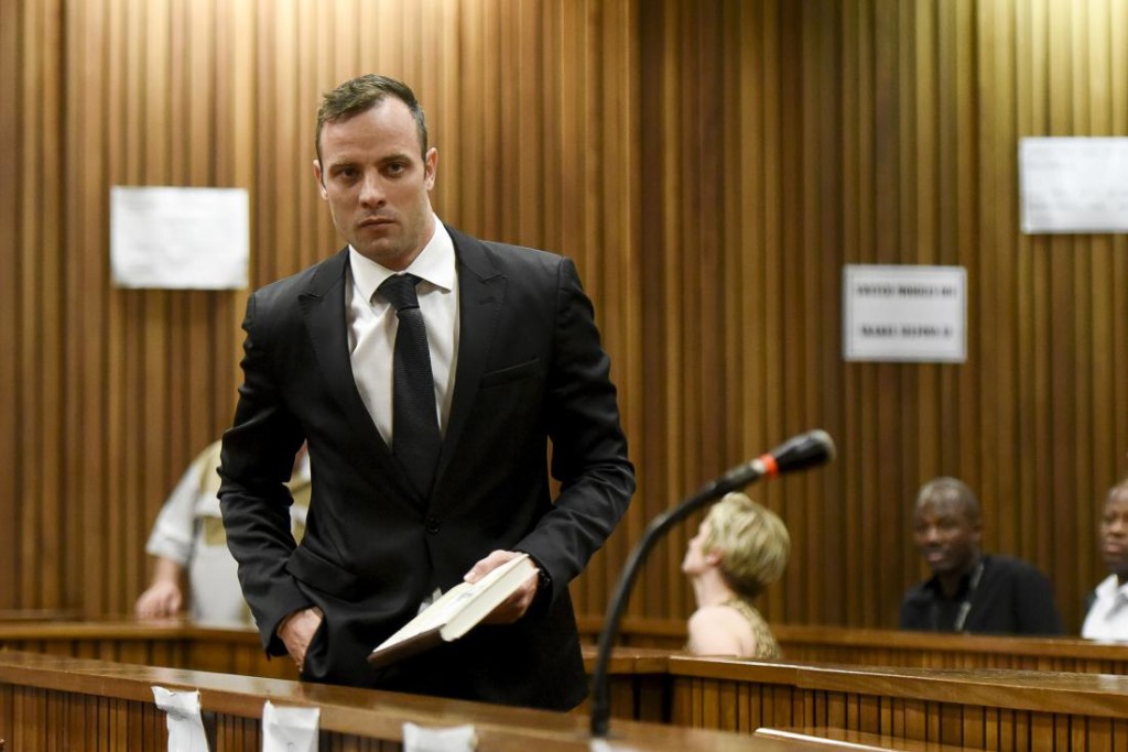 Oscar Pistorius enters the dock at the North Gauteng High Court in Pretoria, South Africa for a bail hearing, December 8, 2015. Photo: Herman Verwey/ REUTERS