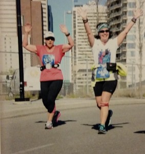 Jennifer and Kari running together at the Calgary marathon.