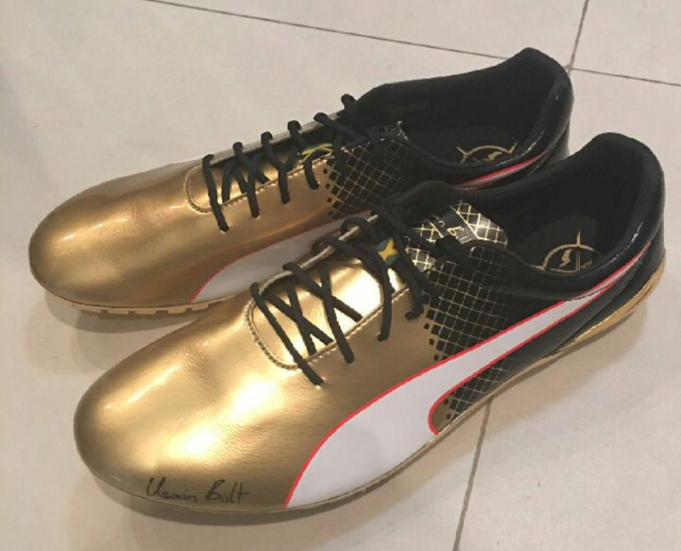 Up close Usain Bolt's Olympic 100m golden spikes Canadian Running