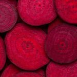 Slices of  fresh organic beetroot for background