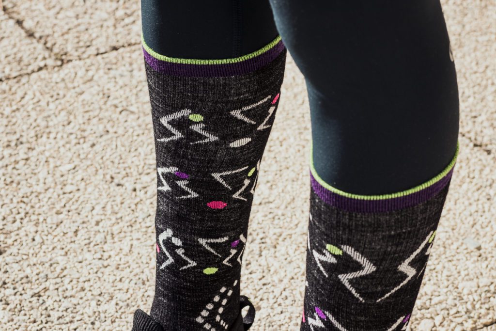 Are socks meant to be worn over, under, or not at all with tights