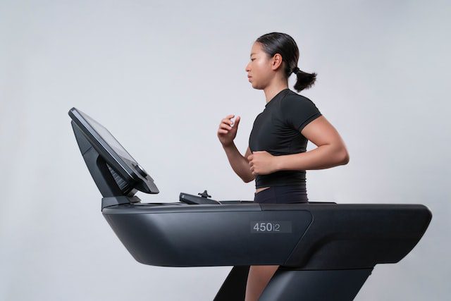 person running on treadmill