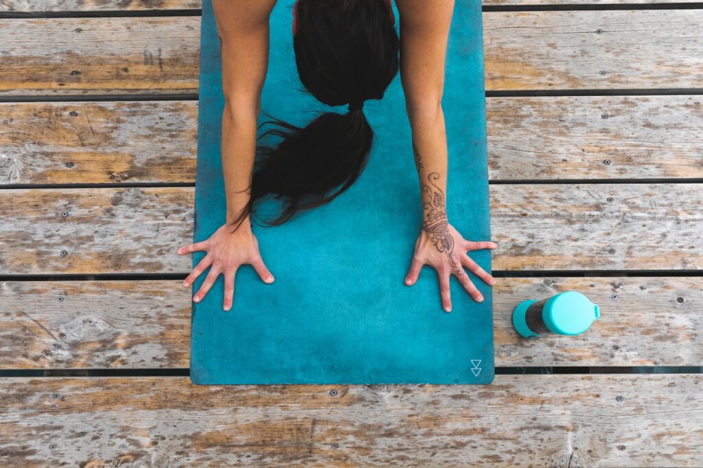 woman and yoga mat
