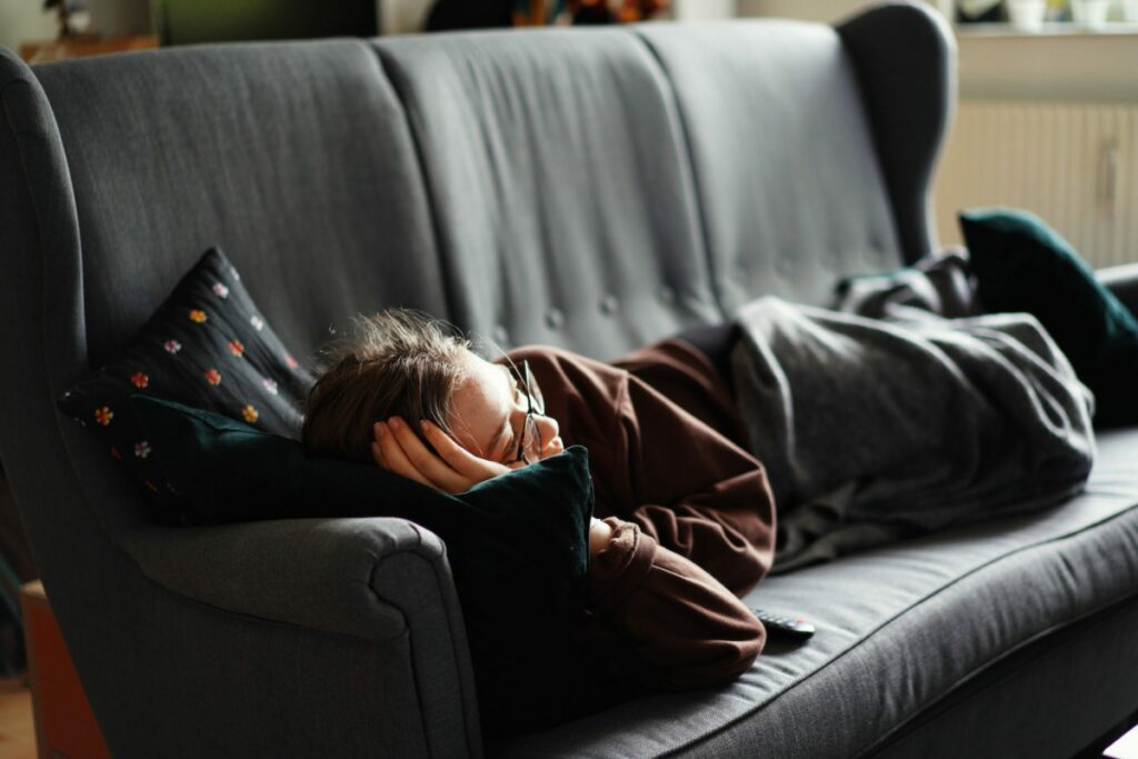Person relaxing on couch