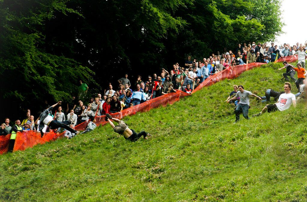 Canadian woman tumbles to win at Gloucester Cheese Rolling race after