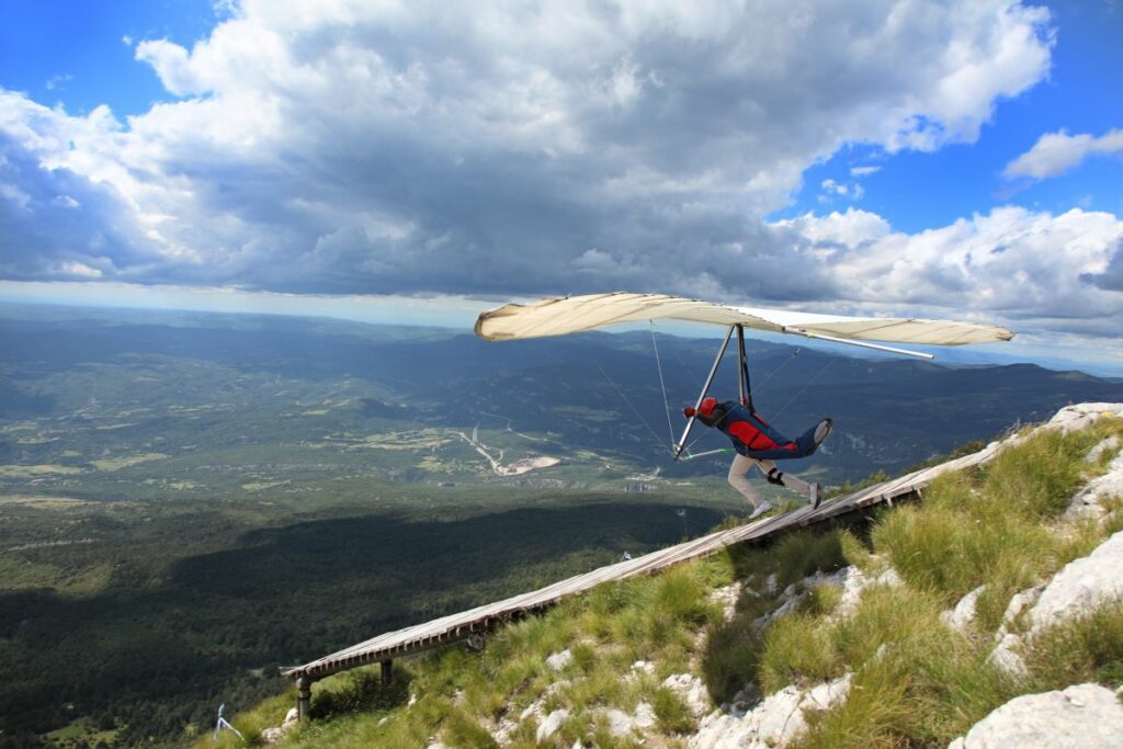 Man preparing to hang glide