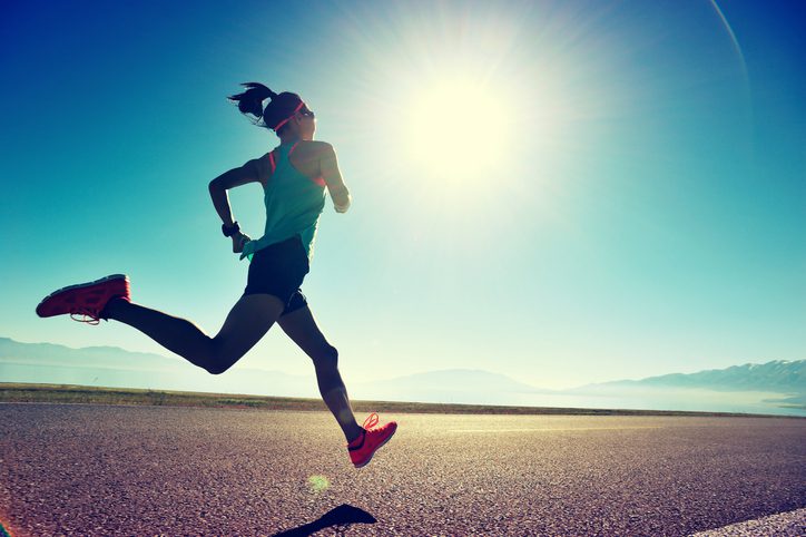 woman runner in sunlight