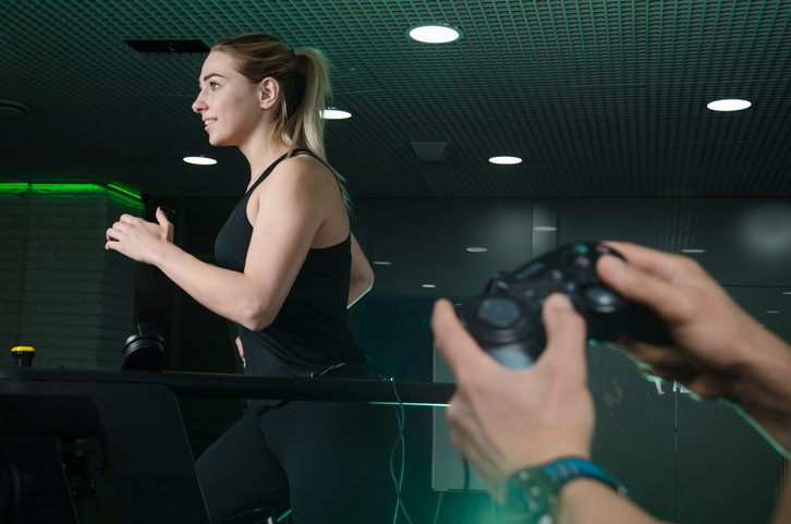 person gaming treadmill